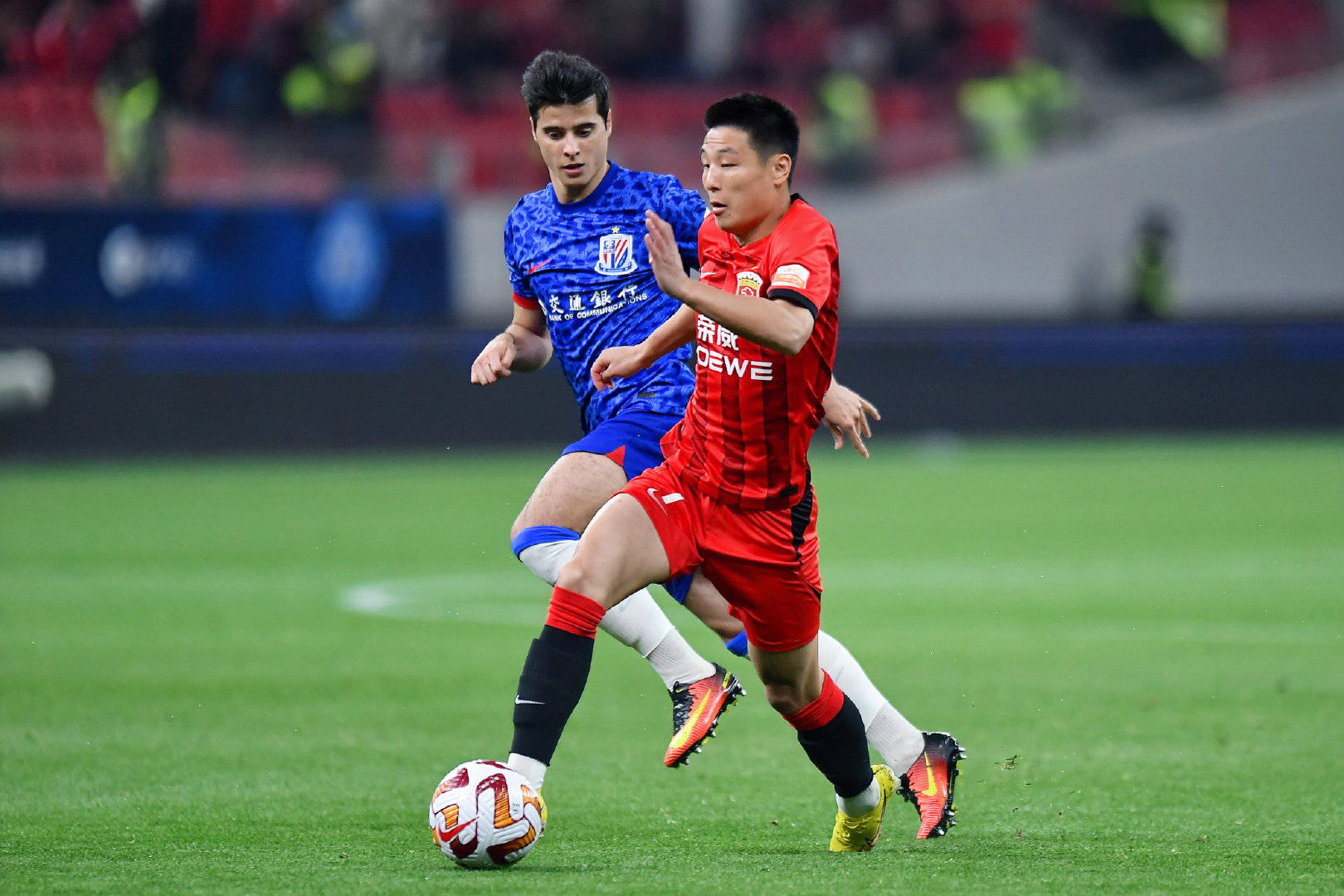 包含卡尔德克梅开二度，上港客场战胜华夏取得胜利的词条